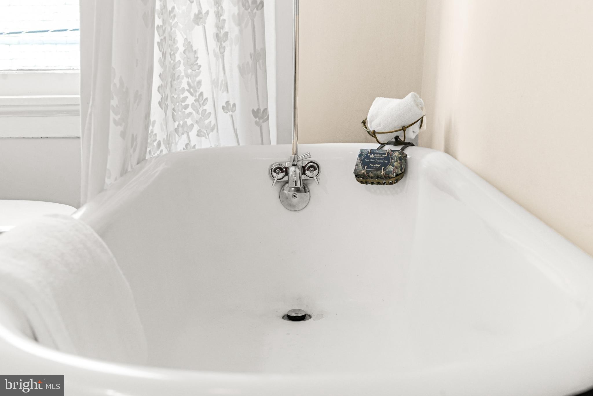 23 West 4th Street Frederick, MD 21701 - Photo 62 of 105 a bathroom with a bathtub