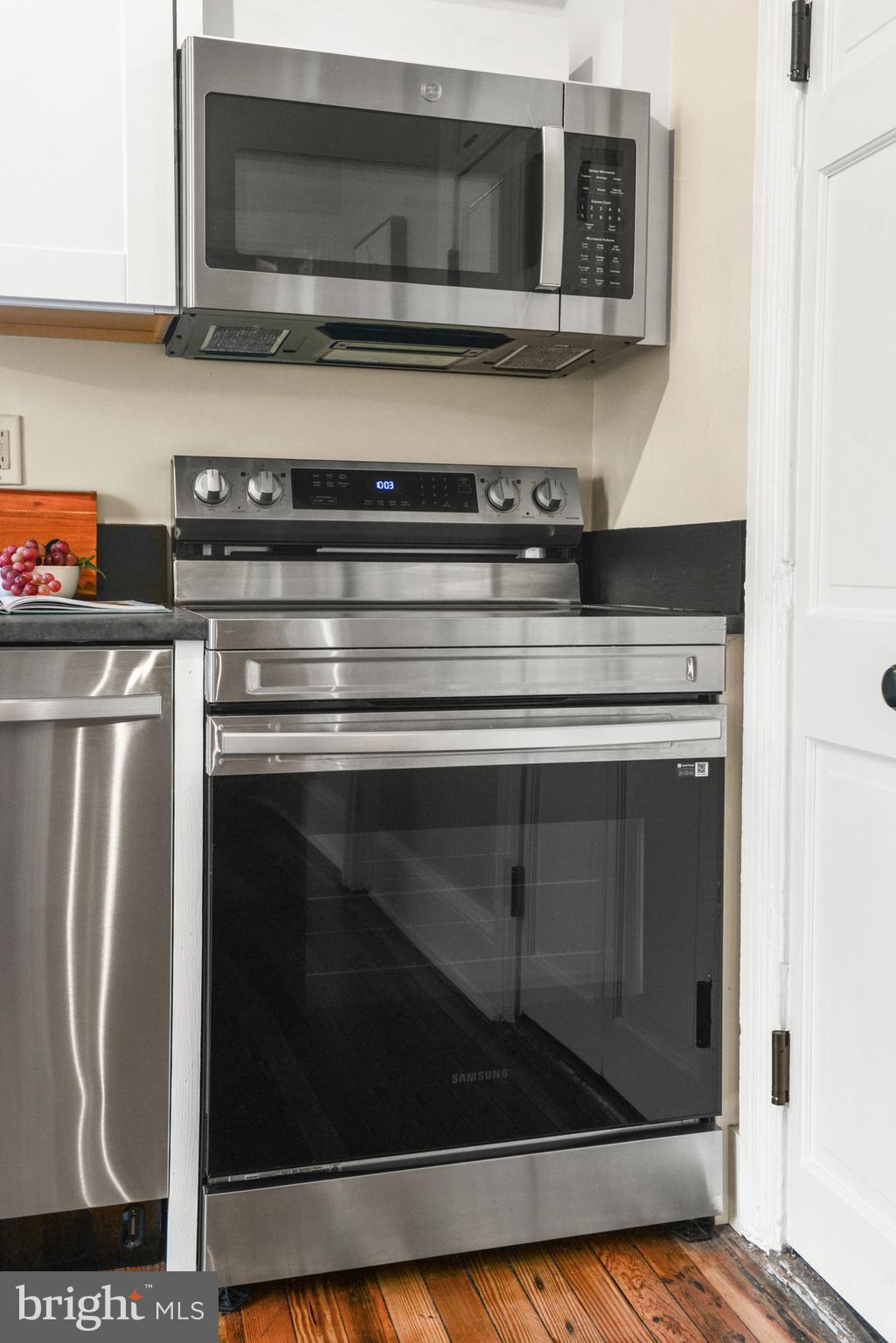 23 West 4th Street Frederick, MD 21701 - Photo 89 of 105 a stove top oven sitting inside of a kitchen