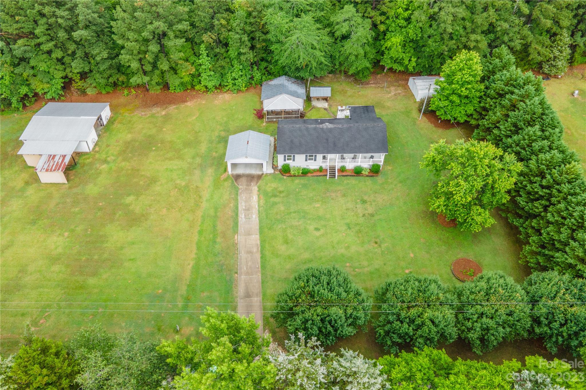 74 Joe Miller Road Jefferson, SC 29718 - Photo 2 of 29 an aerial view of a house with a yard