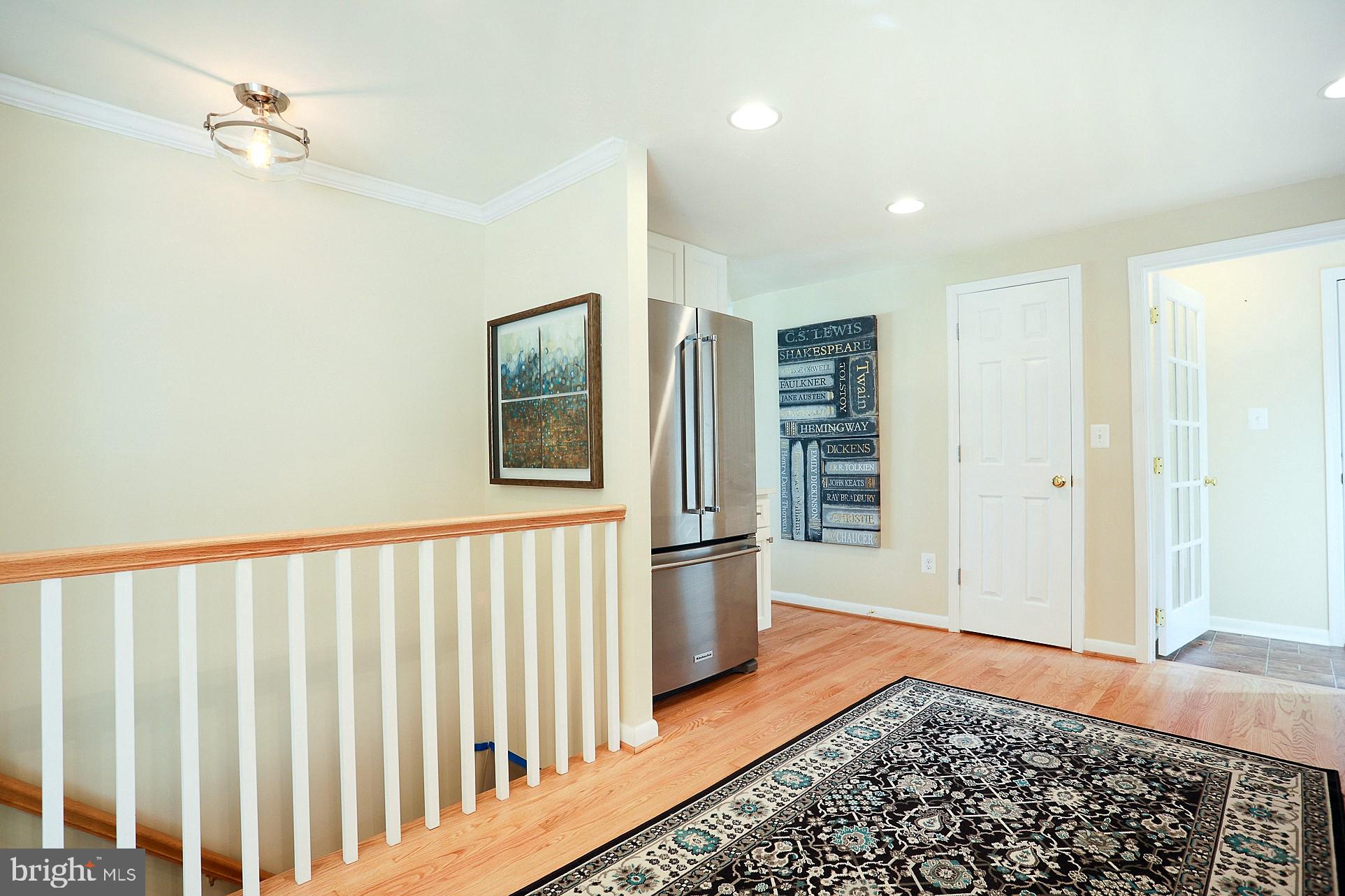 2219 Clark Place Silver Spring, MD 20902 - Photo 21 of 72 OPEN STAIRCASE TO LOWER LEVEL IN KITCHEN