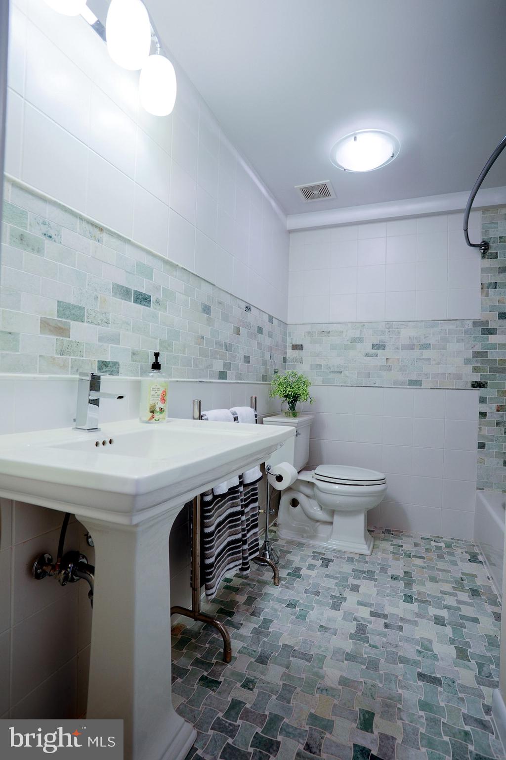 2219 Clark Place Silver Spring, MD 20902 - Photo 55 of 72 GORGEOUS FULL BATH OFF BEDROOM -HAS MARBLE TILE