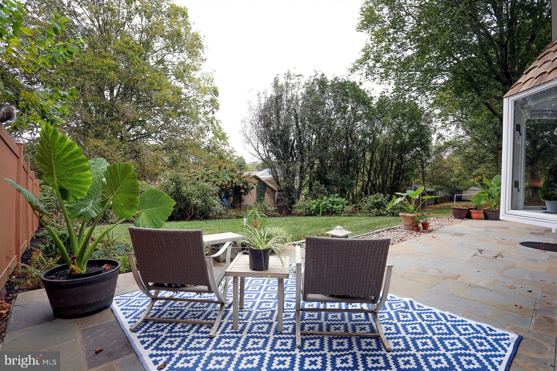 2219 Clark Place Silver Spring, MD 20902 - Photo 59 of 72 FLAGSTONE PATIO RUNS THE LENGTH OF THE HOUSE