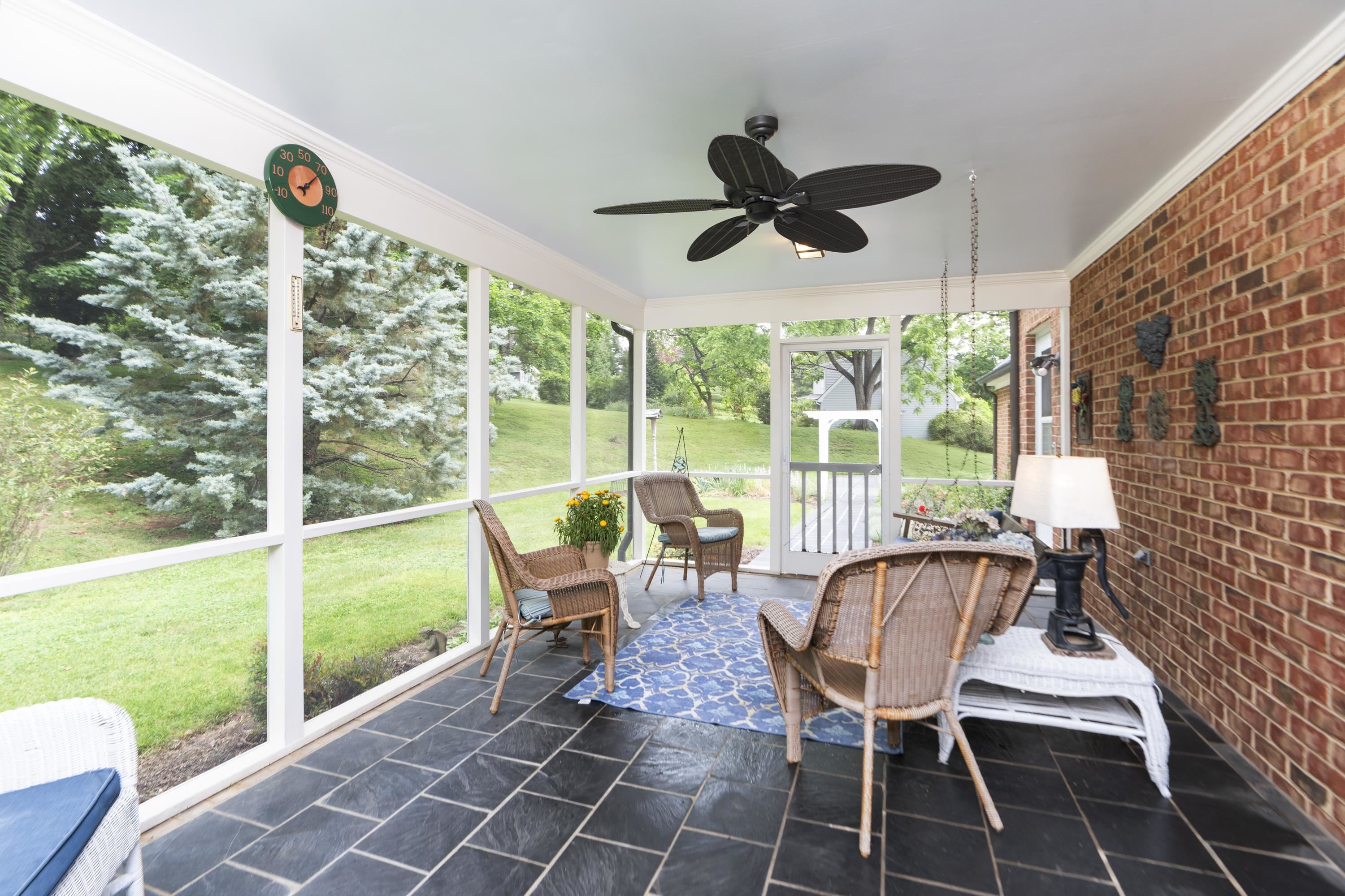 1430 Dogwood Road Staunton, VA 24401 - Photo 32 of 68 a view of a porch with furniture and a yard
