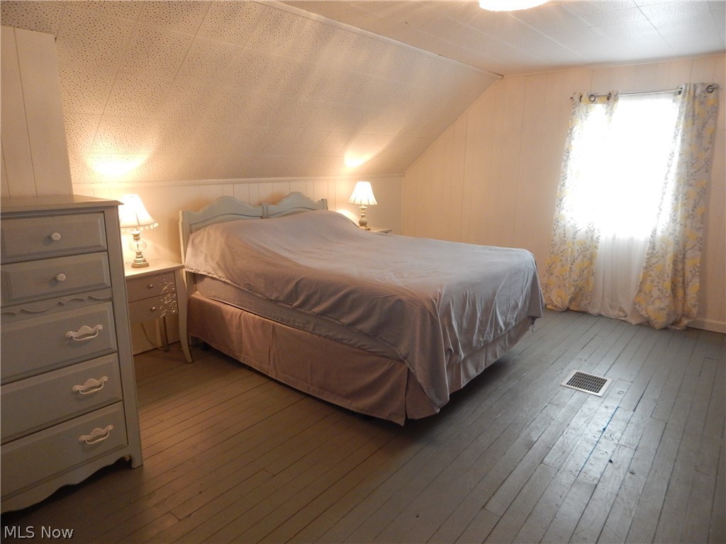 5701 Ackley Road Parma, OH 44129 - Photo 13 of 31 Spacious Bedroom (Up) is freshly painted light and bright and has walk-in Closet.