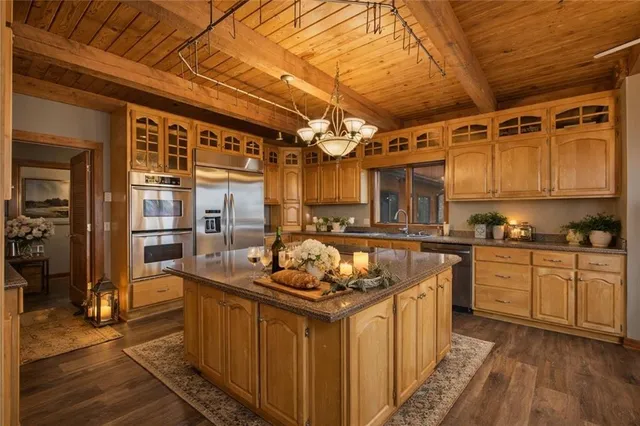 a kitchen that has a lot of cabinets in it