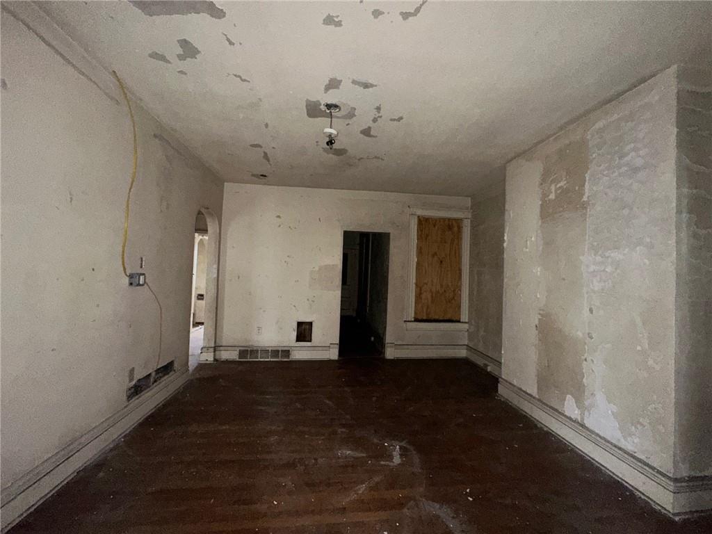 702 Whitney Avenue Pittsburgh, PA 15221 - Photo 25 of 39 wooden floor in an empty room