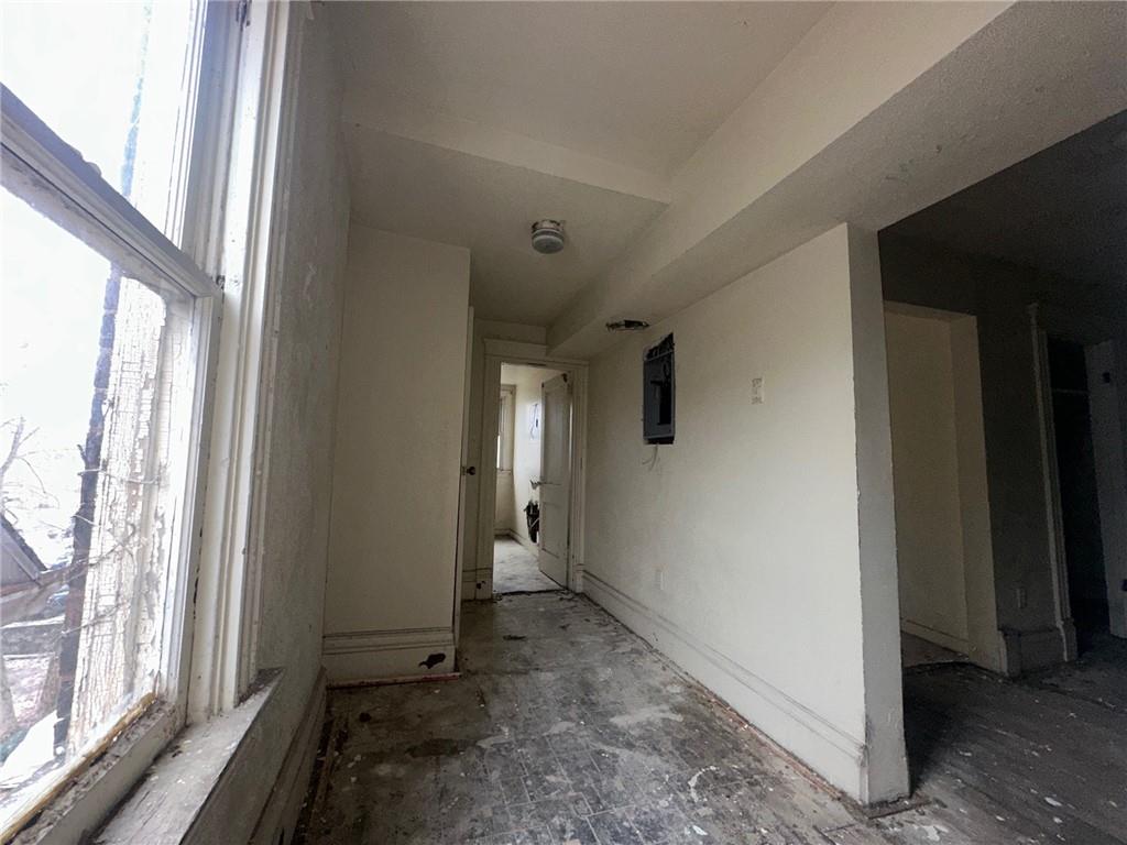 702 Whitney Avenue Pittsburgh, PA 15221 - Photo 28 of 39 a view of a hallway with a window