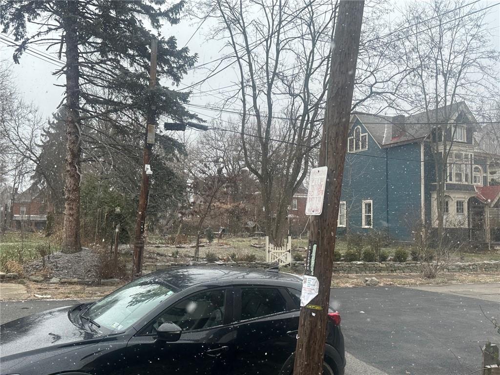 702 Whitney Avenue Pittsburgh, PA 15221 - Photo 37 of 39 a car parked on the side of a street