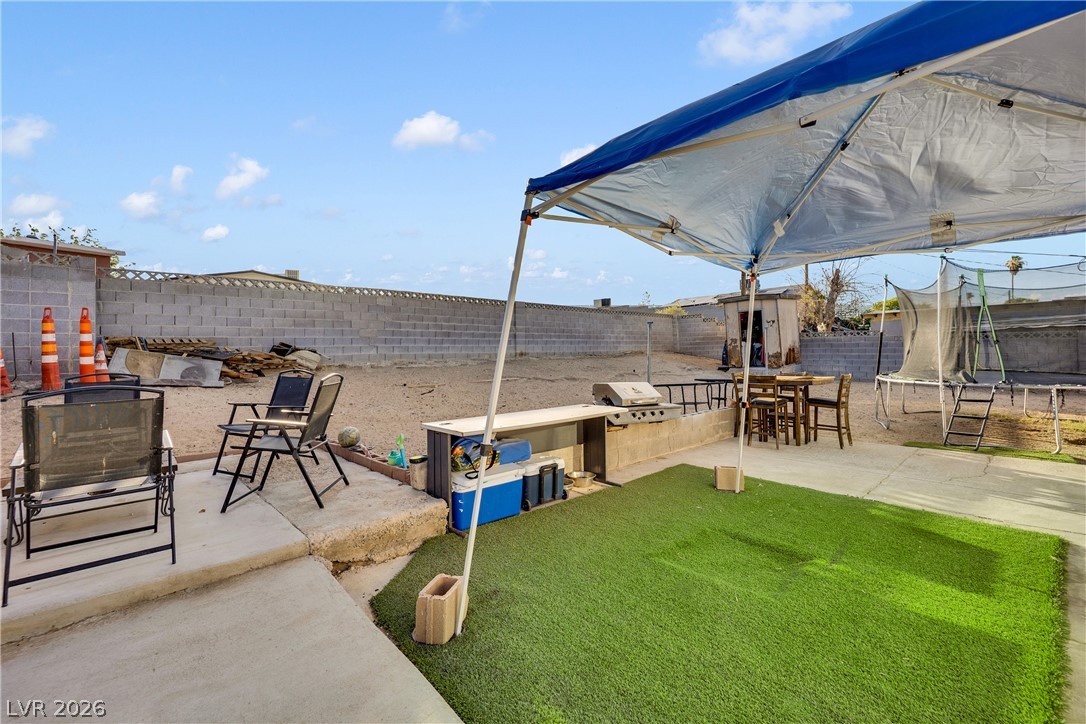 2221 Englestad Street North Las Vegas, NV 89030 - Photo 30 of 32 A spacious yard