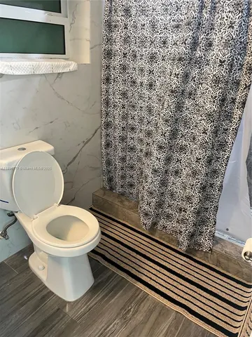 a kitchen with a stove and a microwave