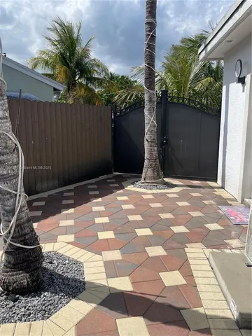 a kitchen with stainless steel appliances a stove top oven and sink