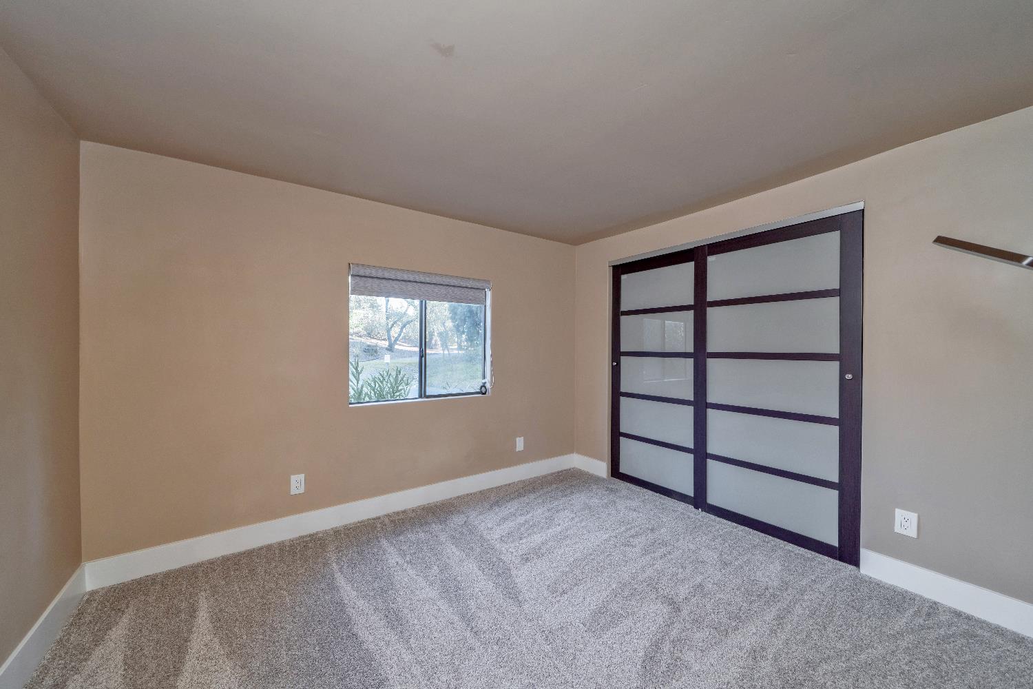 4420 Pleasant Valley Road, Unit 155 Diamond Springs, CA 95619 - Photo 28 of 42 a view of an empty room with a window