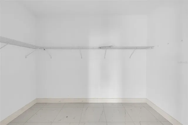 a view of an empty walk in closet