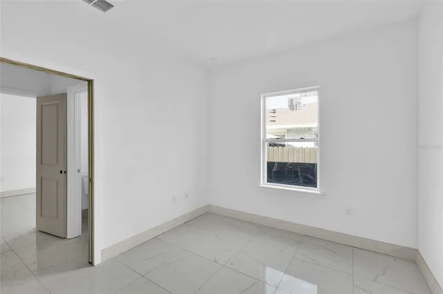 an empty room with a window