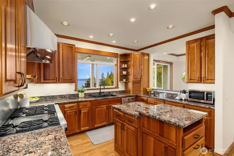 a window with a vase and flowers