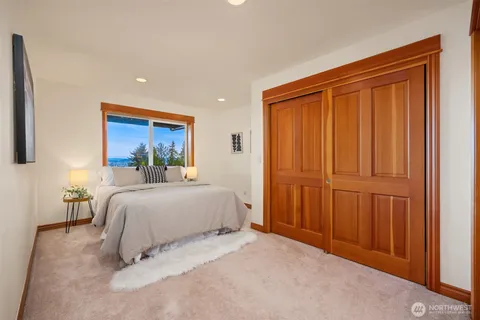 a view of a backyard with plants and a patio