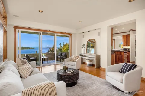 a view of a balcony with furniture