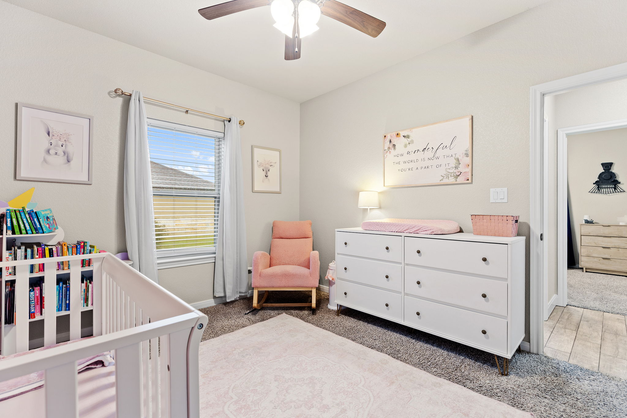 161 Greg Lane Jarrell, TX 76537 - Photo 18 of 35 Neutral-toned room featuring a single window with blinds, ceiling fan, and carpet flooring