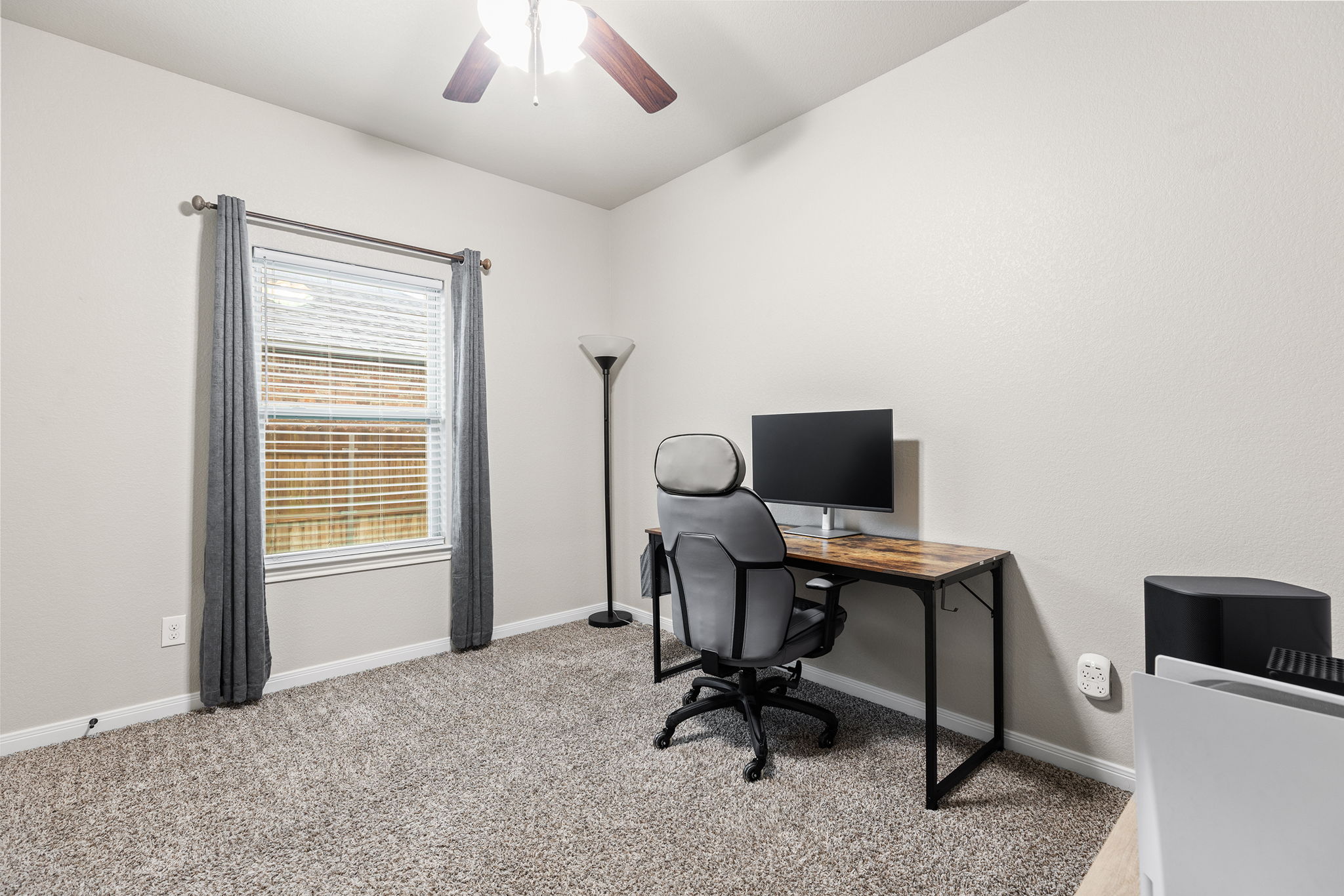 161 Greg Lane Jarrell, TX 76537 - Photo 23 of 35 Neutral painted walls with plush gray carpeting