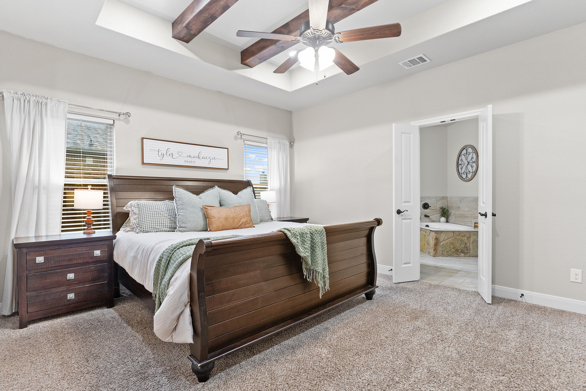 161 Greg Lane Jarrell, TX 76537 - Photo 26 of 35 Spacious bedroom featuring light-toned walls and carpet flooring