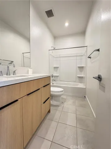 a view of a street with buildings