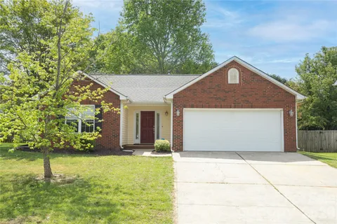 a front view of house with yard
