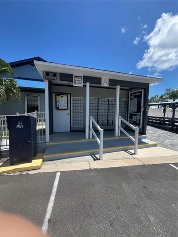 a view of a backyard of the house