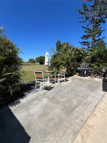 a view of a terrace with sitting area