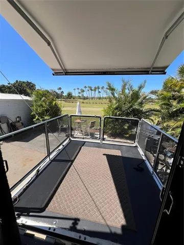 a view of a balcony with city view