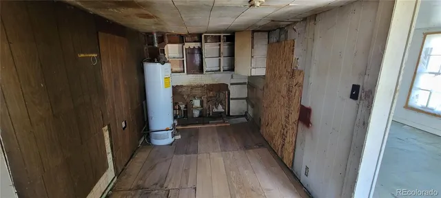 a bathroom with a granite countertop shower