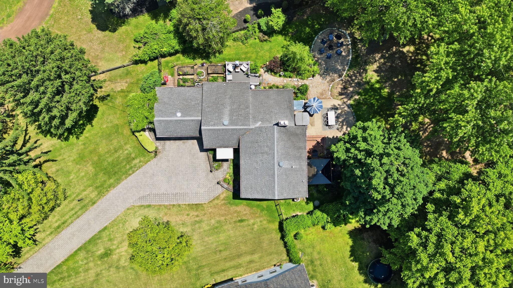 621 River Road Yardley, PA 19067 - Photo 73 of 75 an aerial view of a house with a yard and garden