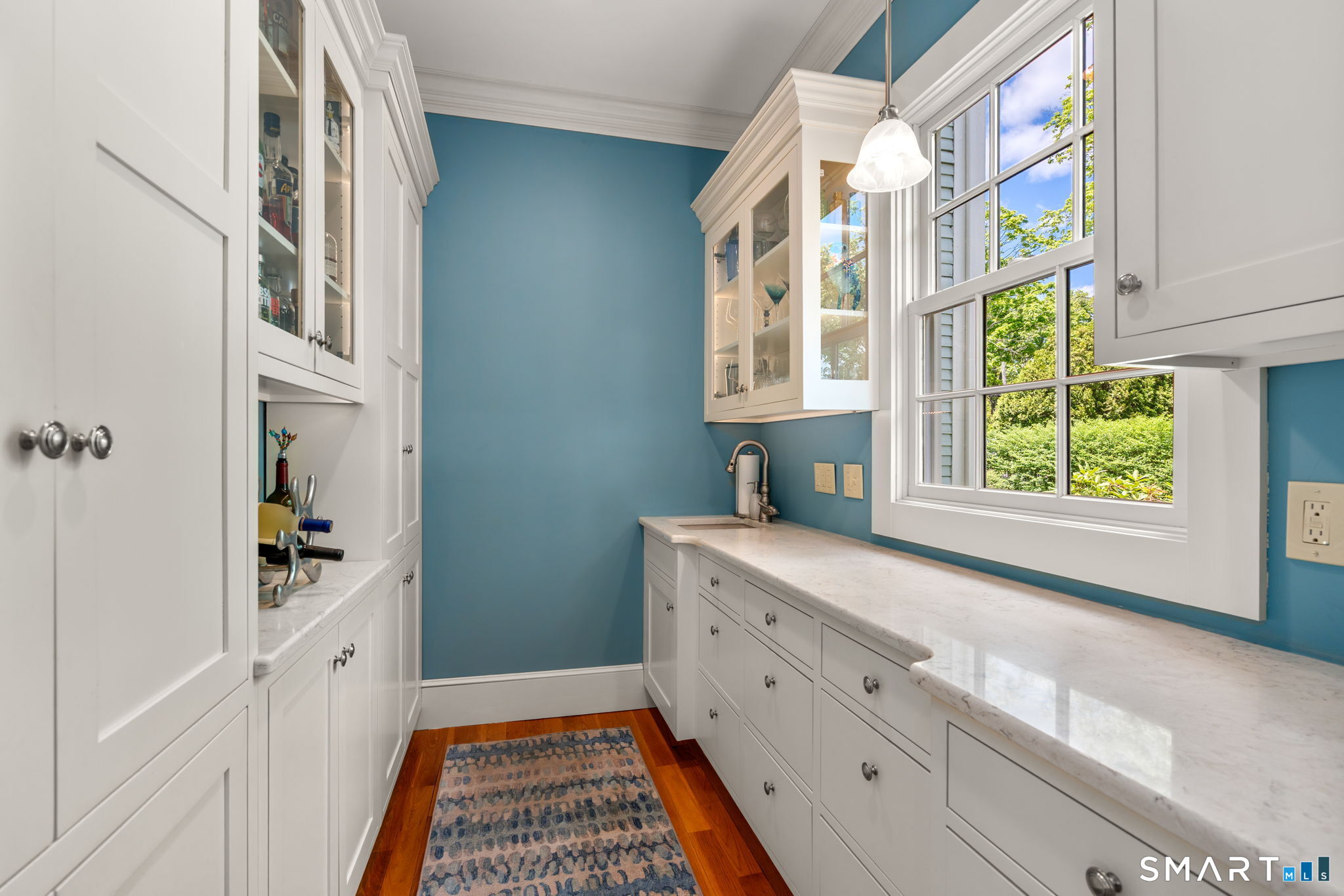 52 South Main Street Suffield, CT 06078 - Photo 11 of 40 a kitchen with a cabinets and window