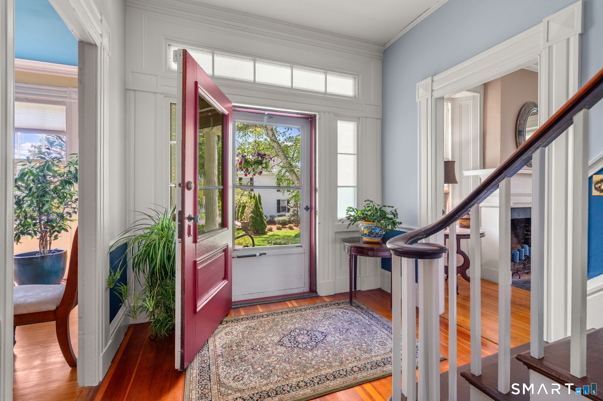 52 South Main Street Suffield, CT 06078 - Photo 12 of 40 a view of entryway with wooden floor and a potted plant