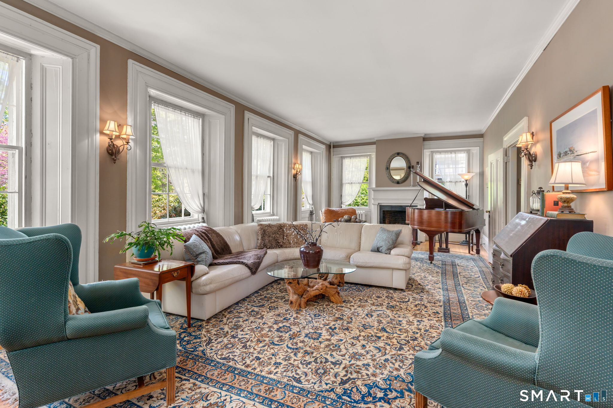 52 South Main Street Suffield, CT 06078 - Photo 18 of 40 a living room with furniture and a large window