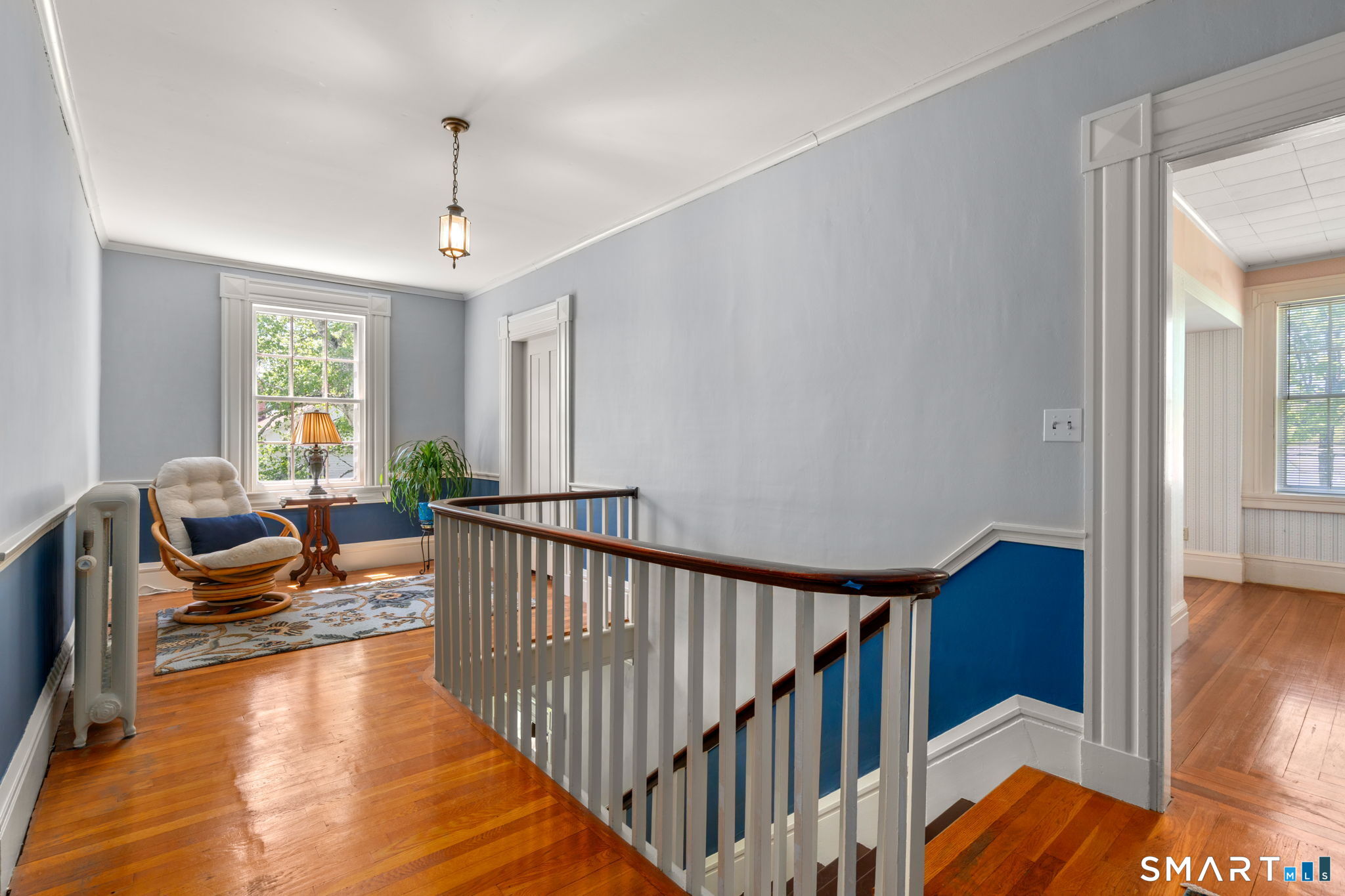 52 South Main Street Suffield, CT 06078 - Photo 24 of 40 a view of entryway livingroom and hall with wooden floor