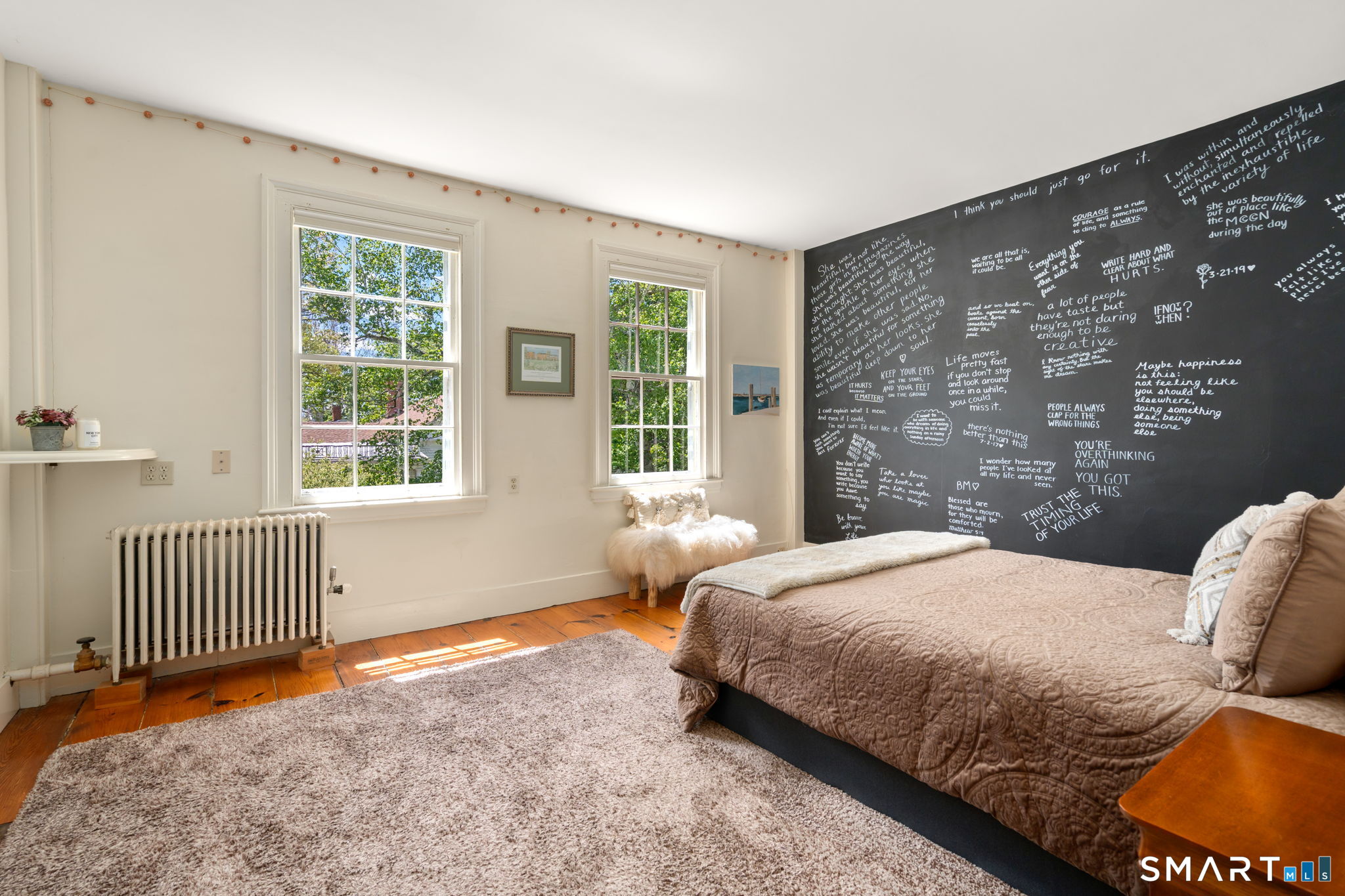 52 South Main Street Suffield, CT 06078 - Photo 29 of 40 a bedroom with a bed and a window