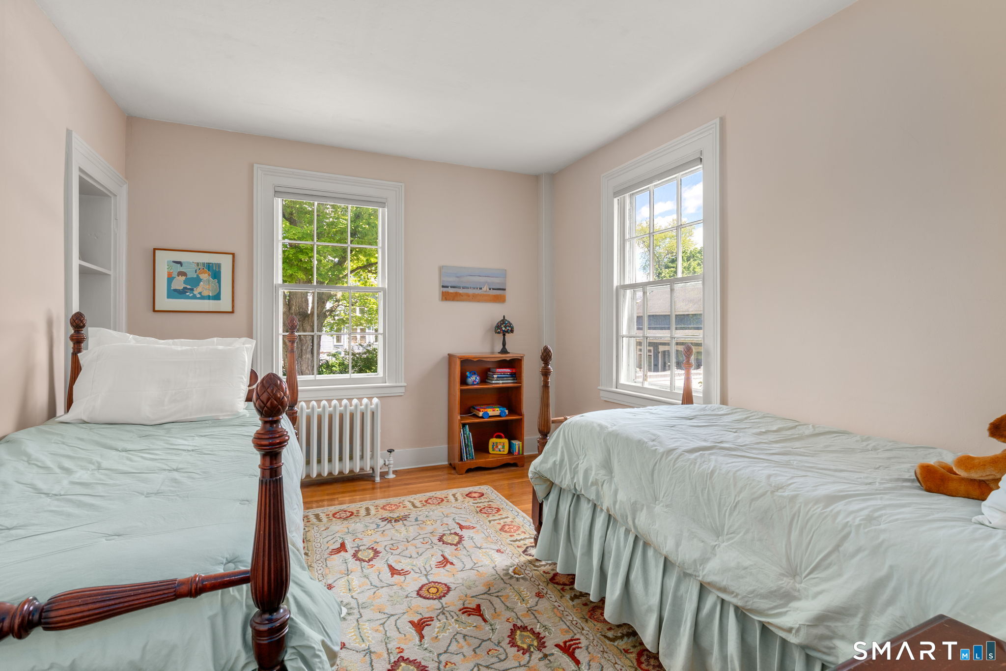 52 South Main Street Suffield, CT 06078 - Photo 33 of 40 a bedroom with a bed and a window