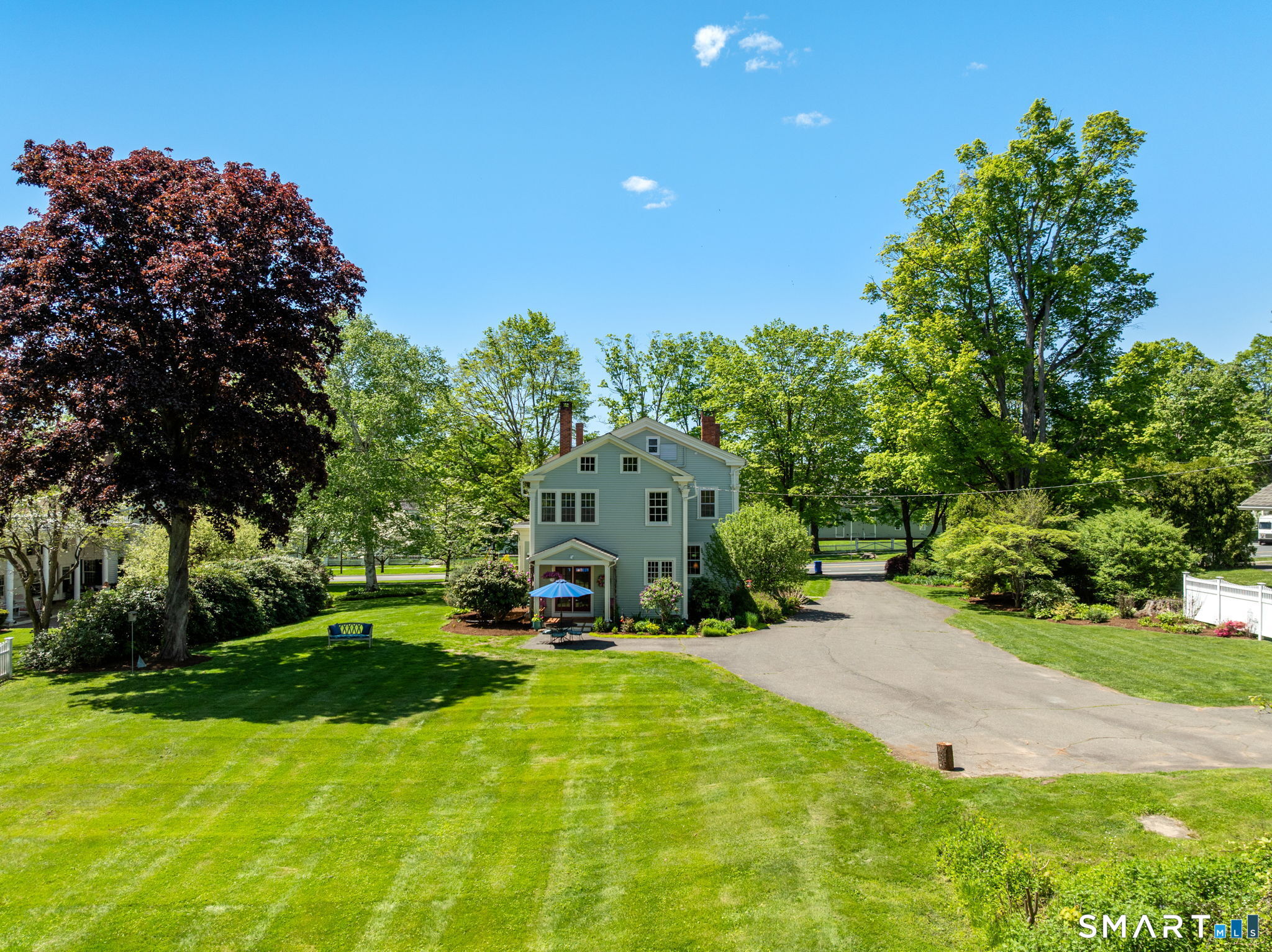 52 South Main Street Suffield, CT 06078 - Photo 36 of 40 a view of a house with a yard