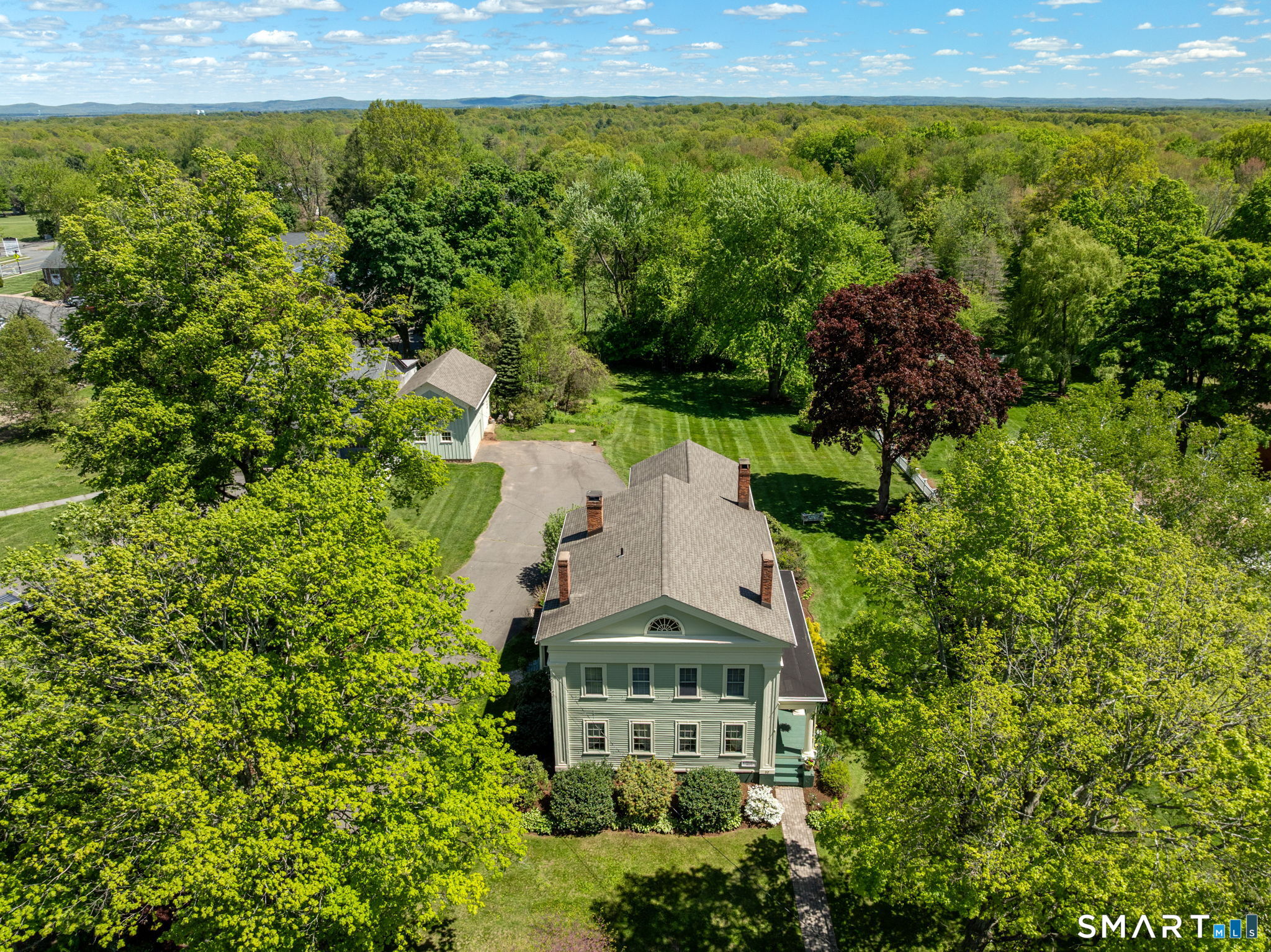 52 South Main Street Suffield, CT 06078 - Photo 39 of 40 a aerial view of a house with a yard