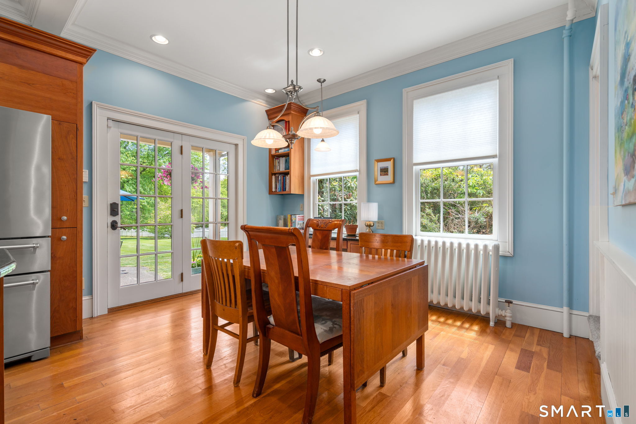 52 South Main Street Suffield, CT 06078 - Photo 9 of 40 a view of a dining room with furniture window and wooden floor