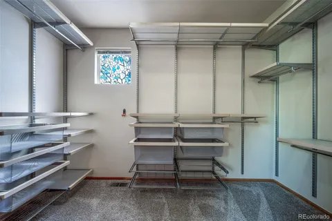 a view of a room with shelves