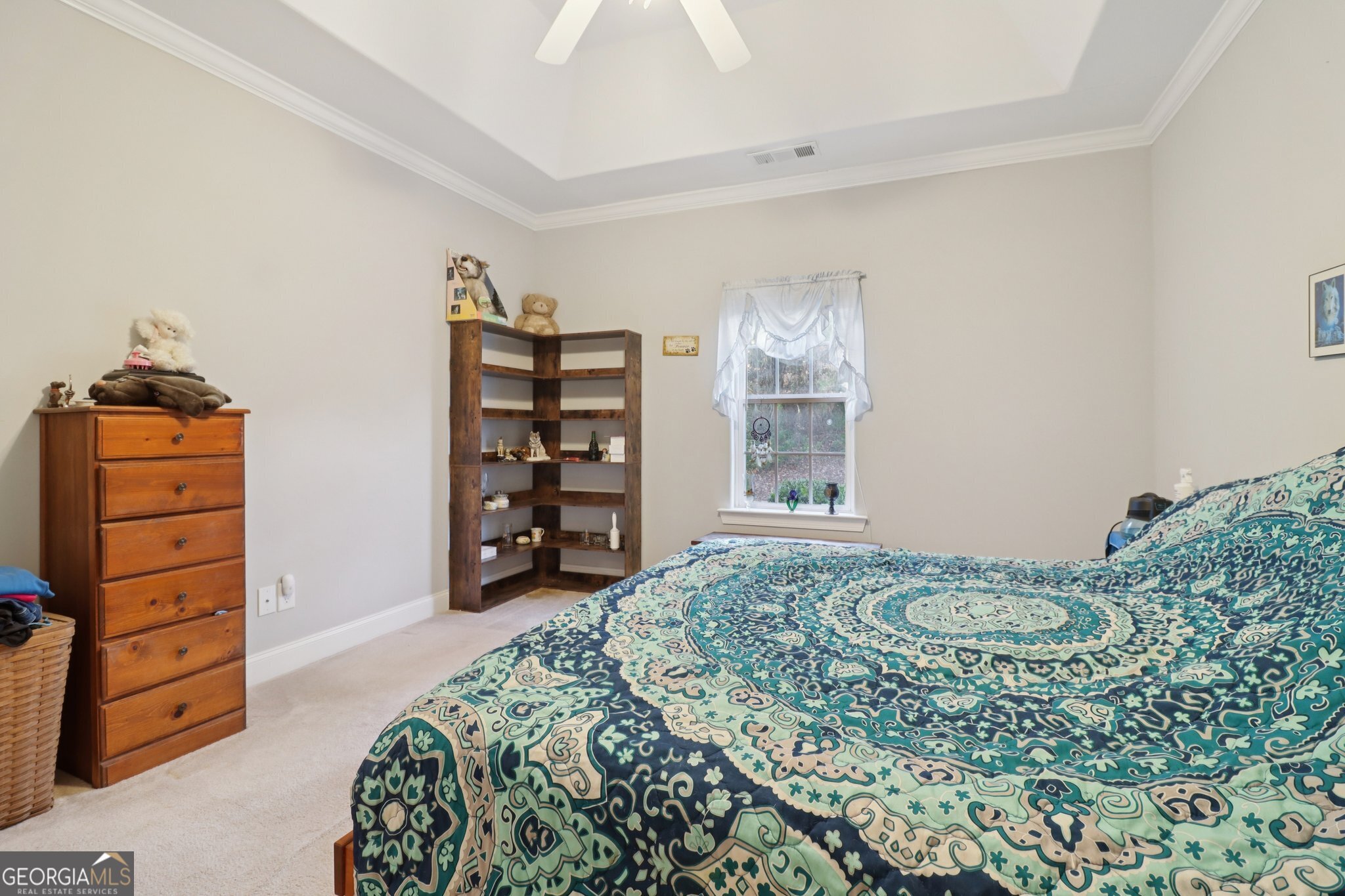 1502 Commonwealth Circle Newnan, GA 30263 - Photo 12 of 30 a bedroom with a bed and a dresser