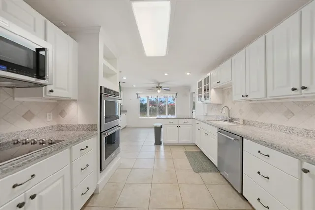 a large kitchen with cabinets