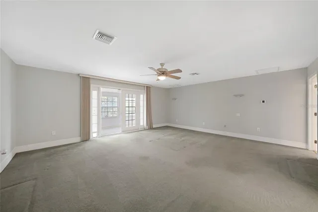 an empty room with windows