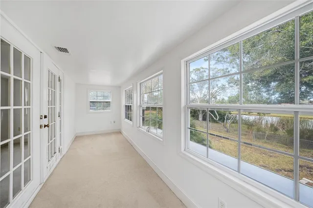 a bathroom with a double vanity sink toilet and shower