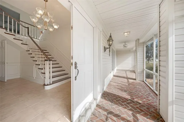 a view of a hallway with stairs