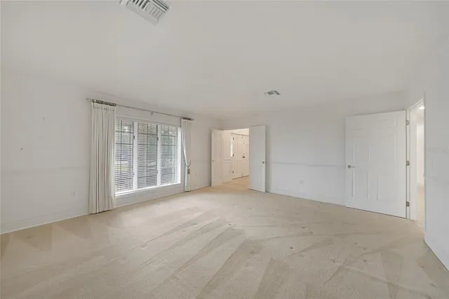 an empty room with windows