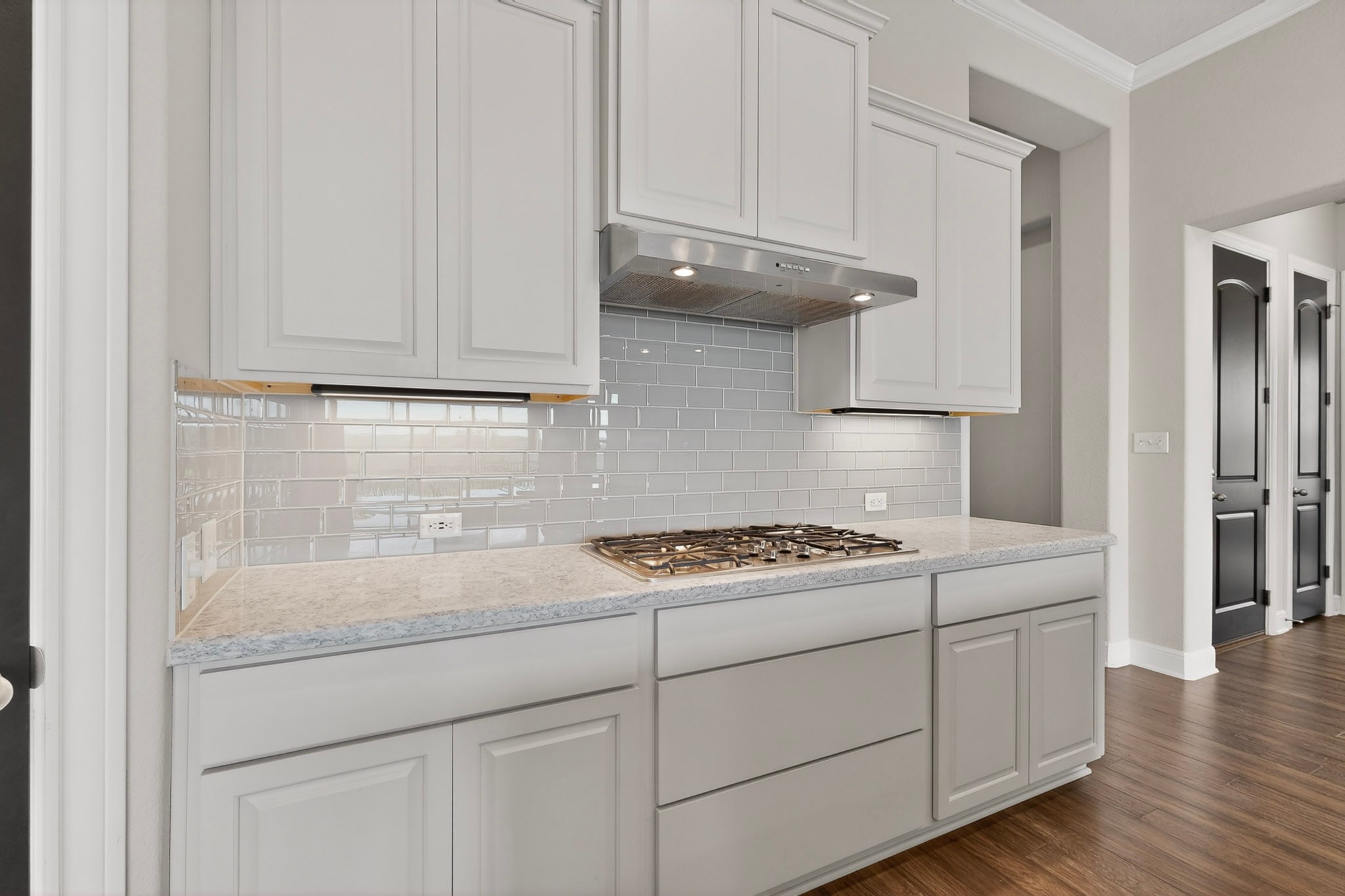 2617 Milan Meadows Drive Leander, TX 78641 - Photo 6 of 40 Culinary delights await in this modern kitchen with stainless steel appliances and abundant cabinetry.