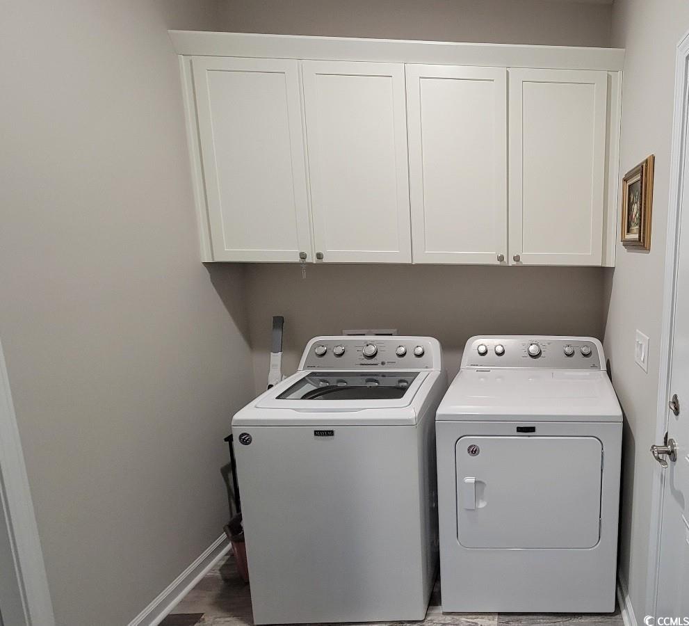 372 Leste Road Myrtle Beach, SC 29588 - Photo 11 of 25 Laundry room with cabinets and washing machine and