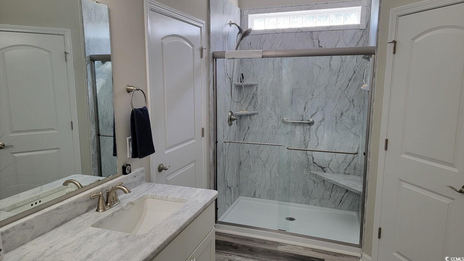 372 Leste Road Myrtle Beach, SC 29588 - Photo 15 of 25 Bathroom featuring hardwood / wood-style flooring,